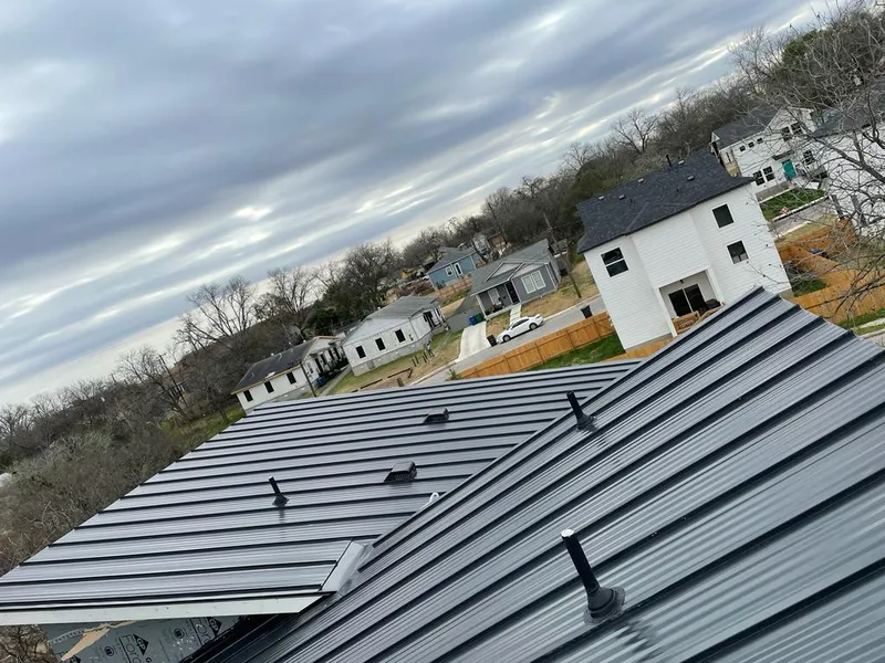 Standing seam metal roof panels with vents for Skylight Repair in Berkeley Heights